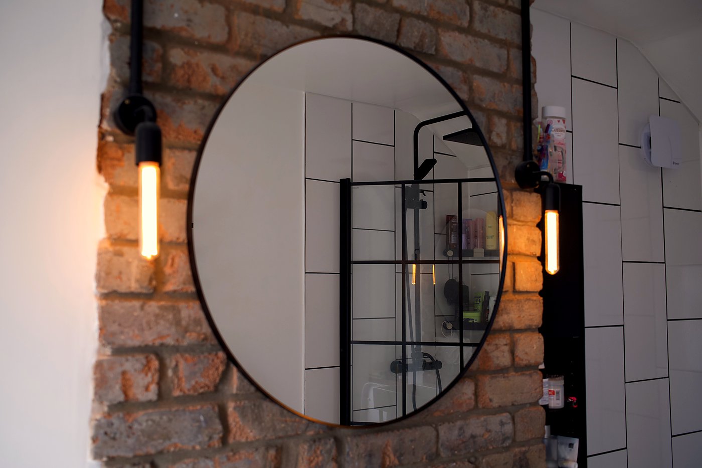 Feature bathroom lighting installation with Edison tube wall lights, Cardiff — installed by Livvingale